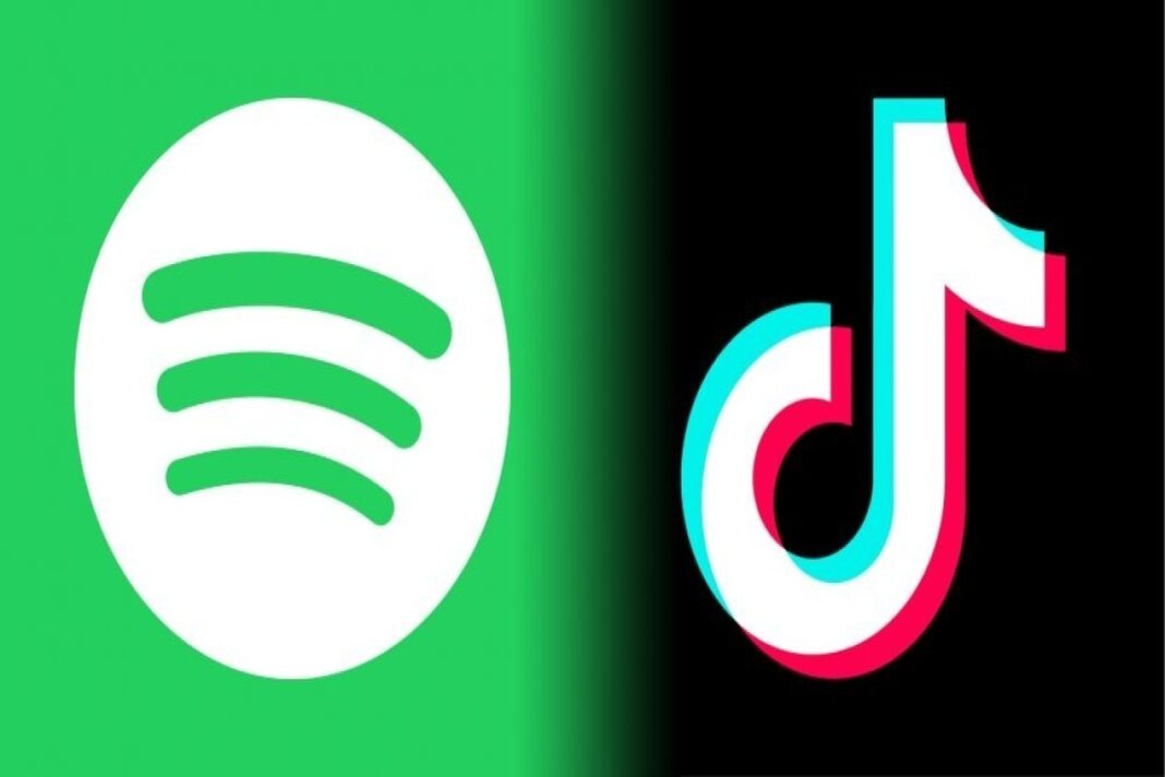 spotify-tiktok-tax Логотипы Spotify и TikTok на экране смартфона